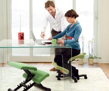 woman on dealing chair at desk