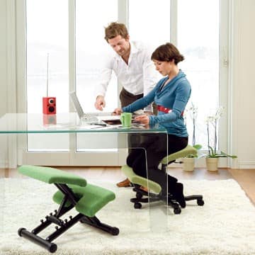 woman on dealing chair at desk