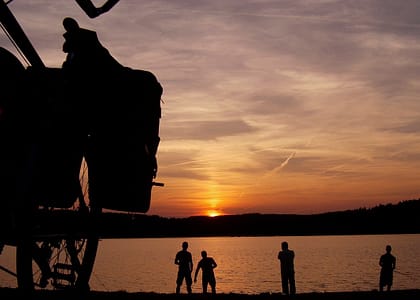 Back pack hanging with sunset back ground