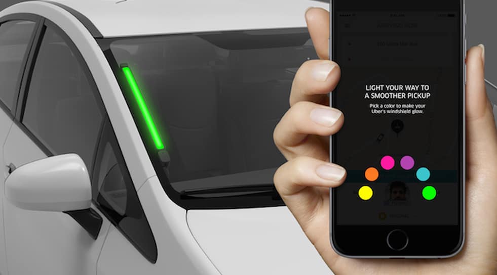 smartphone with car in background